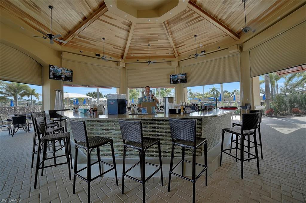 8962 Quarry Drive Naples, FL 34120 - Photo 30 of 35 a view of a dining room with furniture window and outside view
