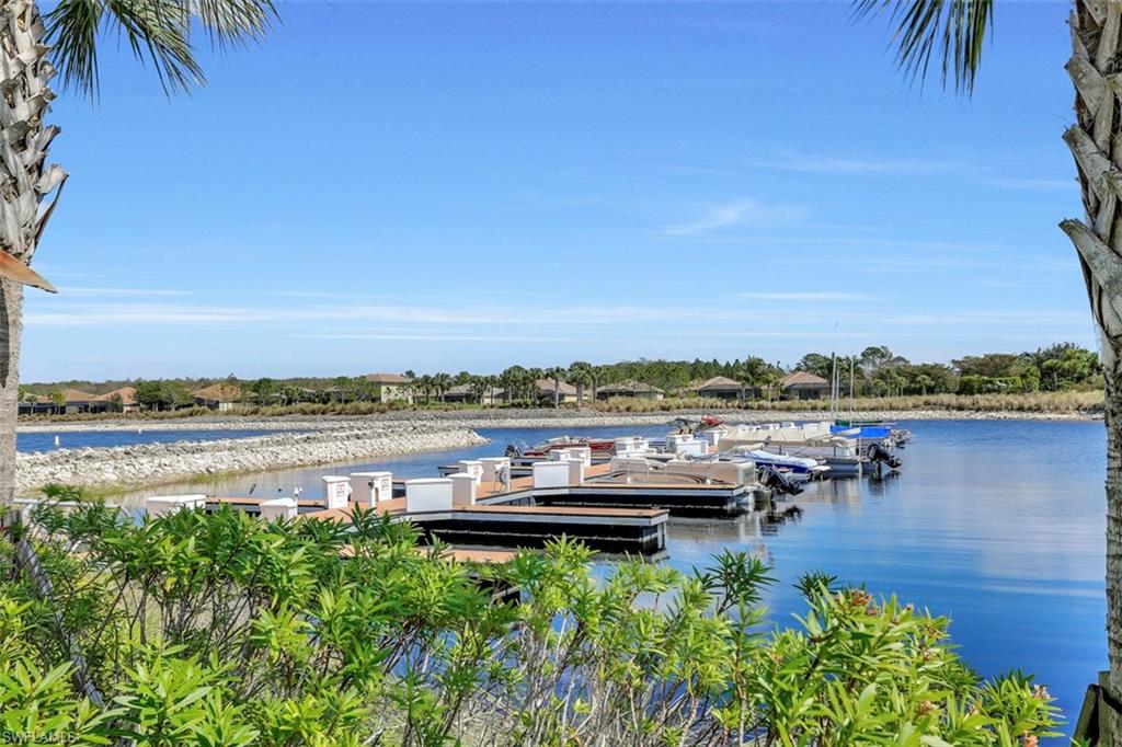 8962 Quarry Drive Naples, FL 34120 - Photo 35 of 35 a view of a lake with a city