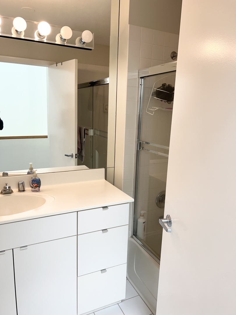 353 Milford Road Deerfield, IL 60015 - Photo 14 of 19 a bathroom with a sink and a mirror