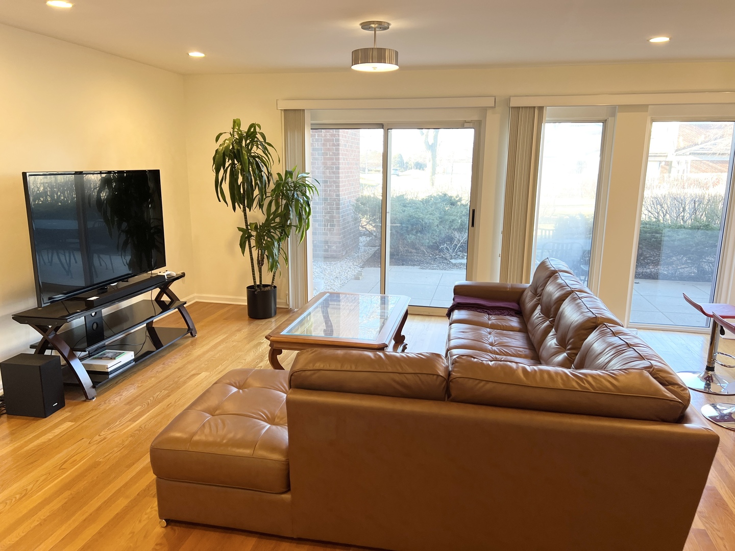 353 Milford Road Deerfield, IL 60015 - Photo 3 of 19 a living room with furniture and a flat screen tv
