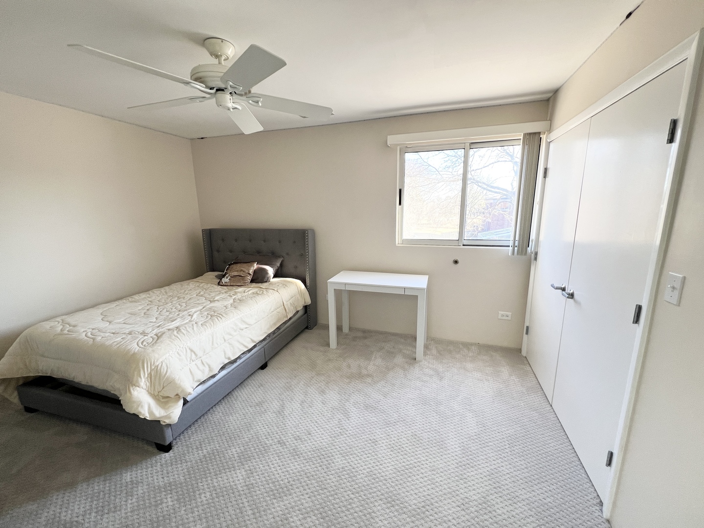 353 Milford Road Deerfield, IL 60015 - Photo 7 of 19 a bedroom with a bed and a window