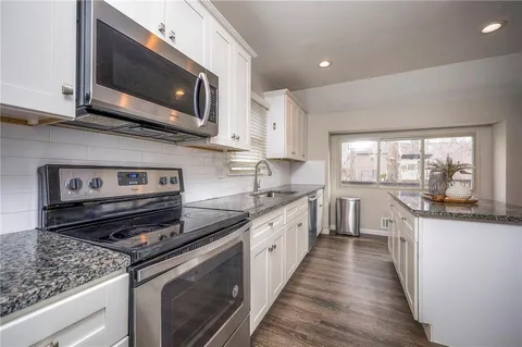 $399,900 | 9901 Taylor Drive, Overland Park, KS 66212