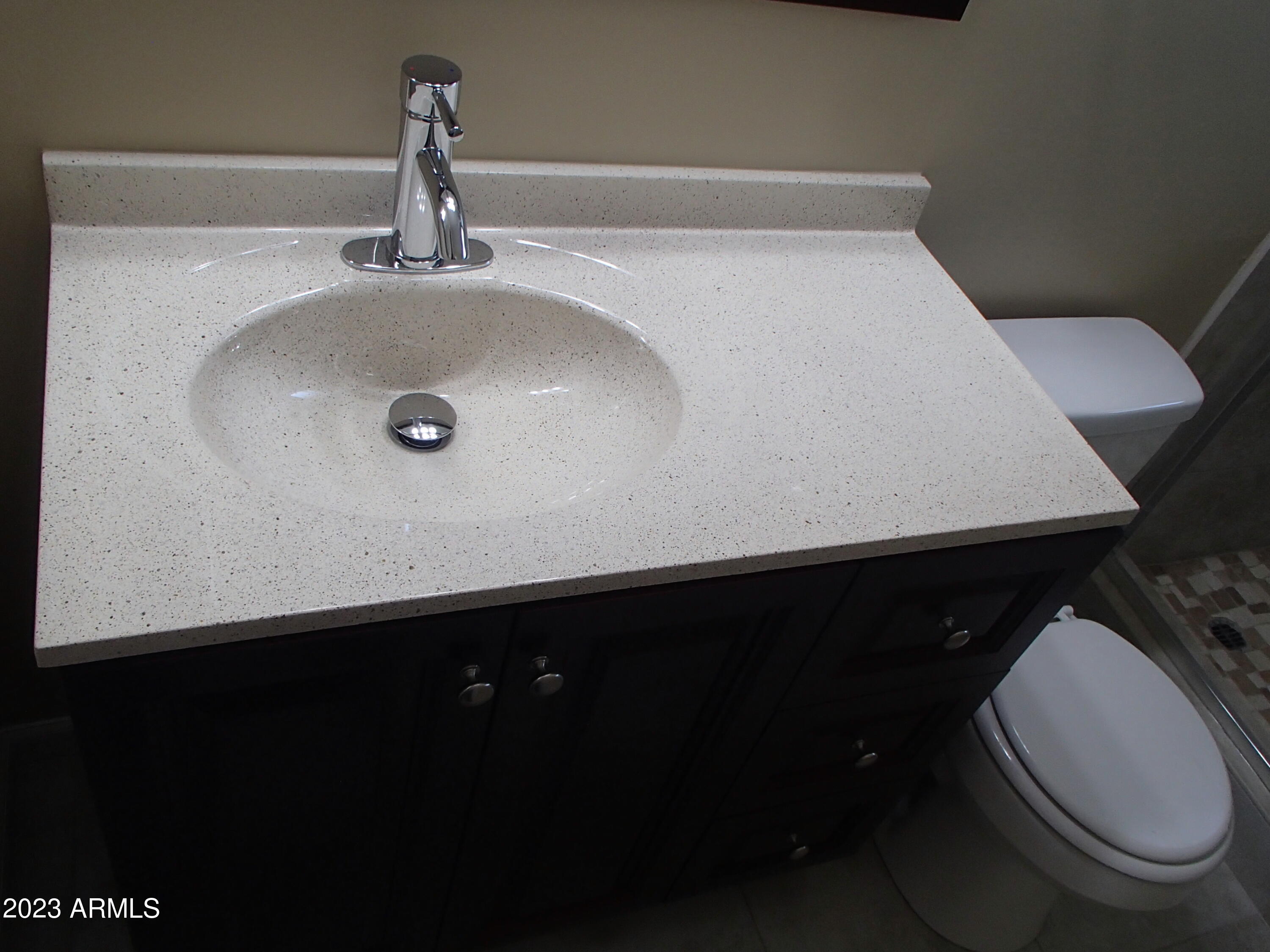 1125 West Colter Street Phoenix, AZ 85013 - Photo 11 of 16 a close view of a sink in a bathroom