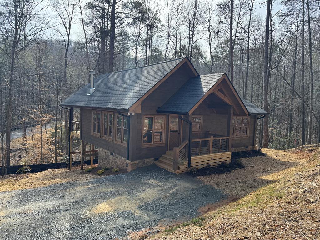 639 North Moreland Drive Blue Ridge, GA 30513 - Photo 1 of 53 a view of a house with a yard and wooden fence
