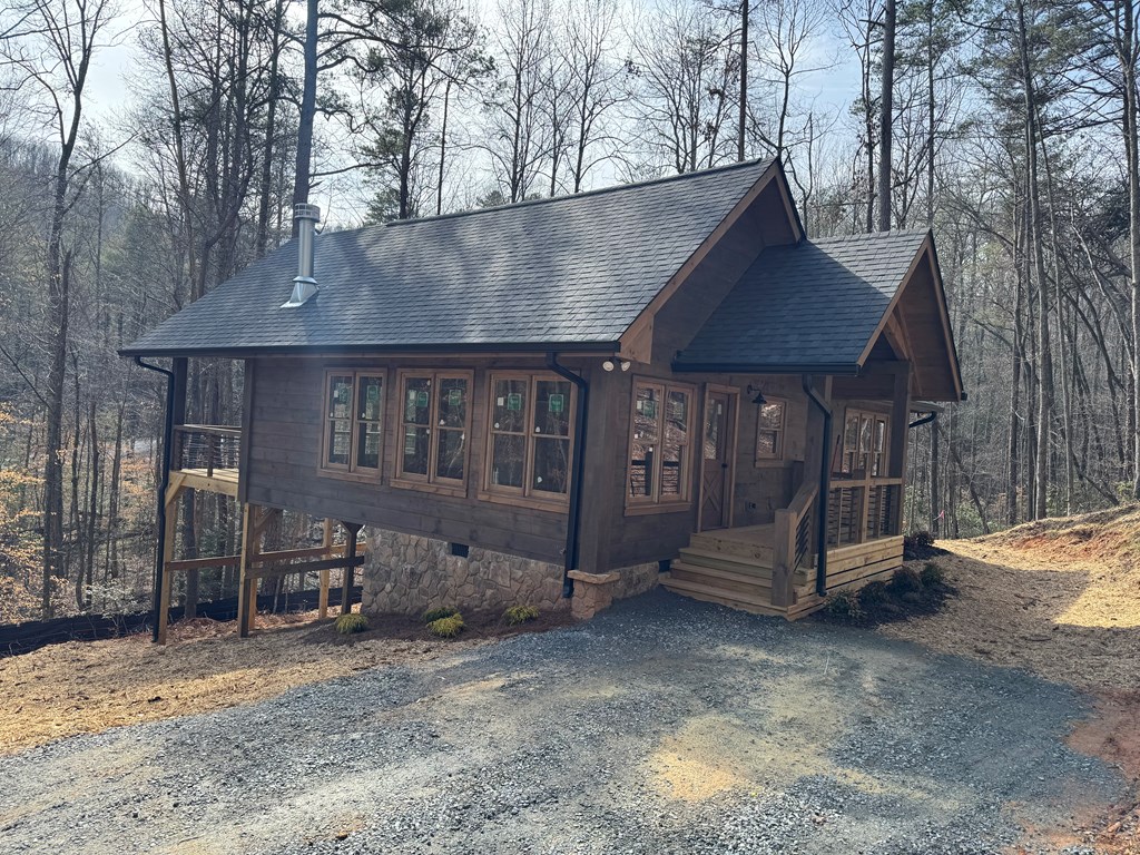 639 North Moreland Drive Blue Ridge, GA 30513 - Photo 23 of 53 a view of a house with a yard and wooden fence