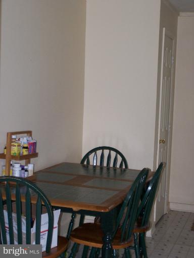 7614 Post Road Hanover, MD 21076 - Photo 14 of 17 Eating Table in Kitchen