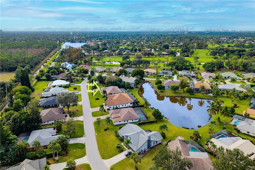 1916 Countess Court Naples, FL 34110 - Photo 11 of 43 an aerial view of residential houses with outdoor space