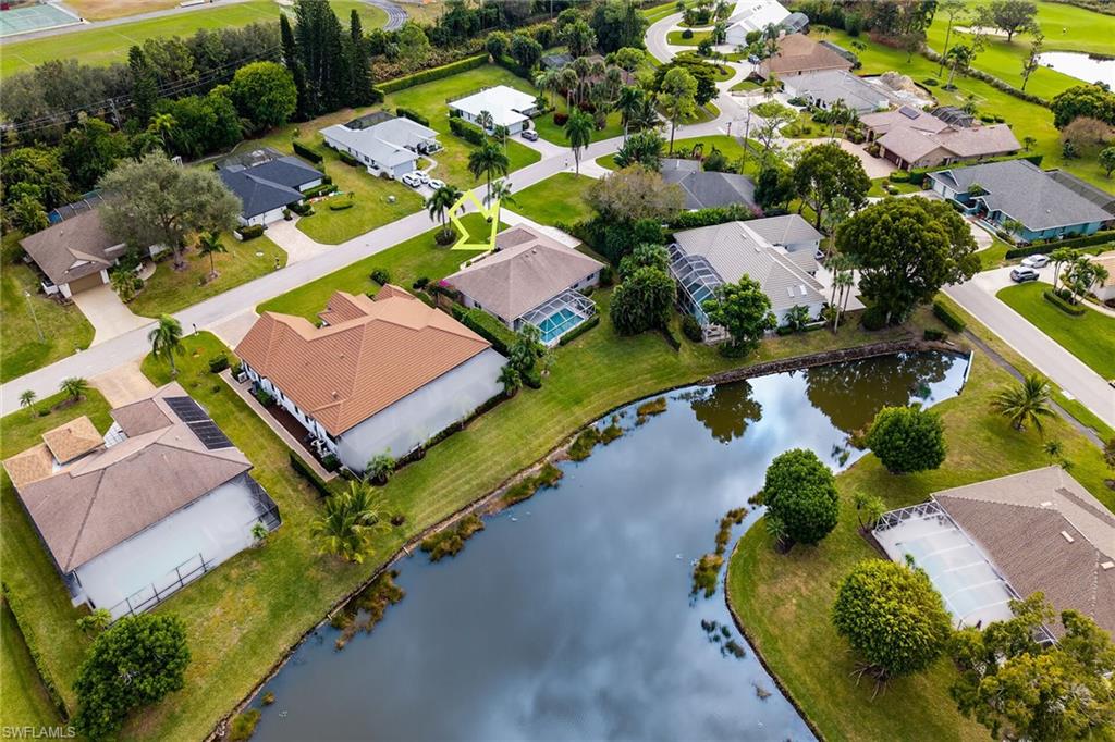 1916 Countess Court Naples, FL 34110 - Photo 10 of 43 an aerial view of residential house with outdoor space and street view