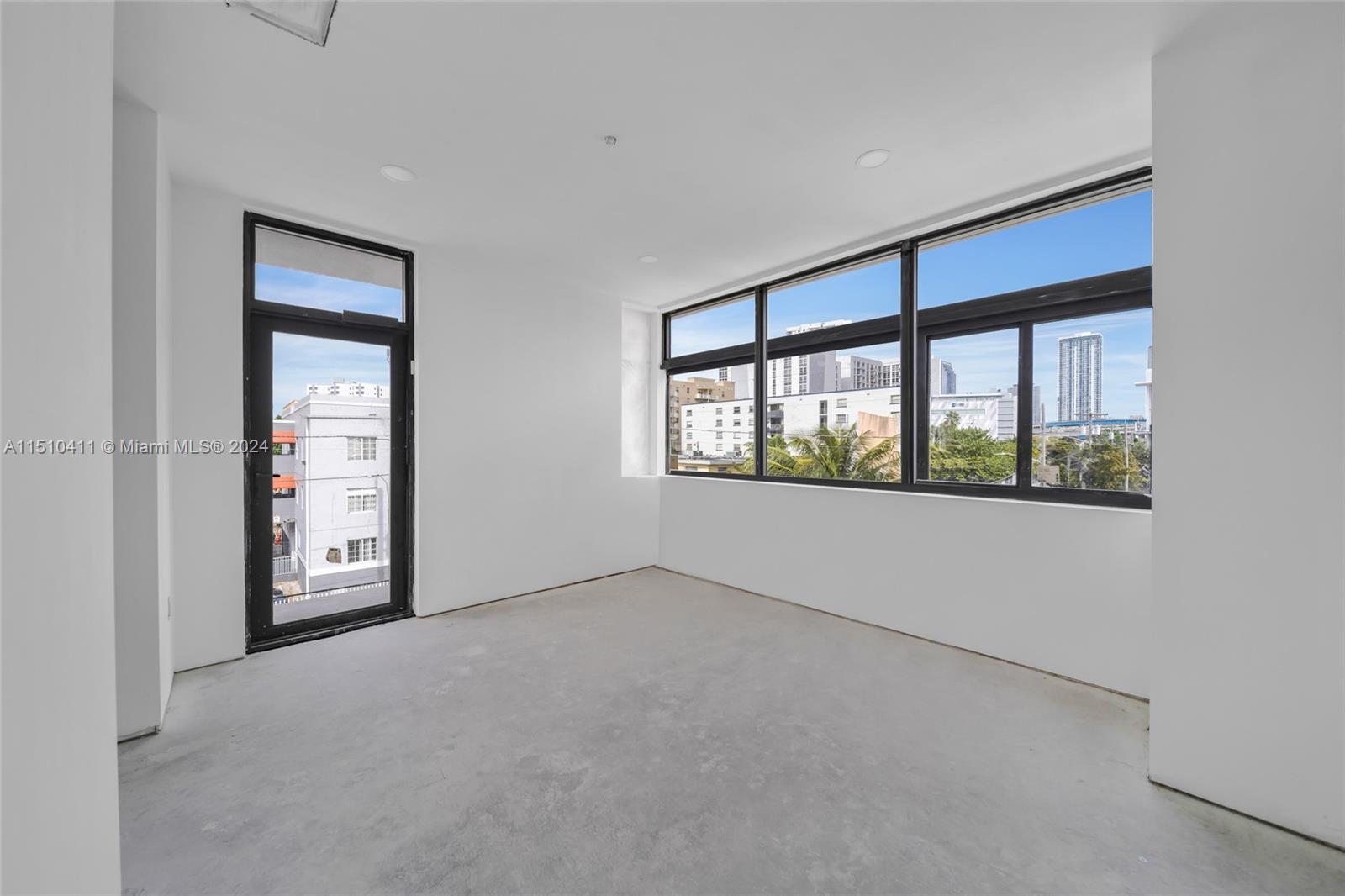 526 Southwest 2nd Street Miami, FL 33130 - Photo 21 of 22 a view of an empty room with a window
