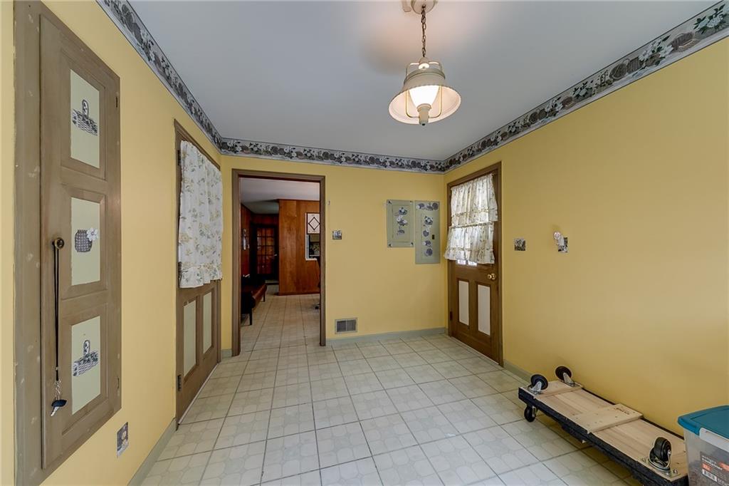 6223 Hulsey Road Clermont, GA 30527 - Photo 20 of 53 a view of a hallway with wooden shelves