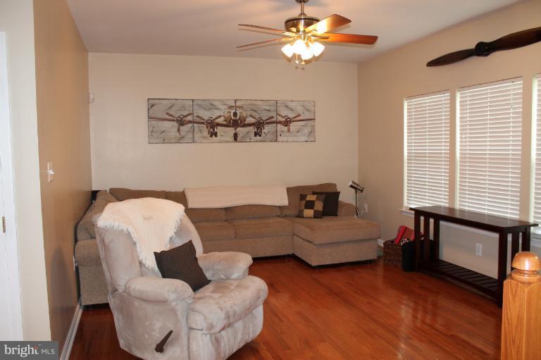 9 Boise Road Inwood, WV 25428 - Photo 8 of 30 a living room with furniture and a window