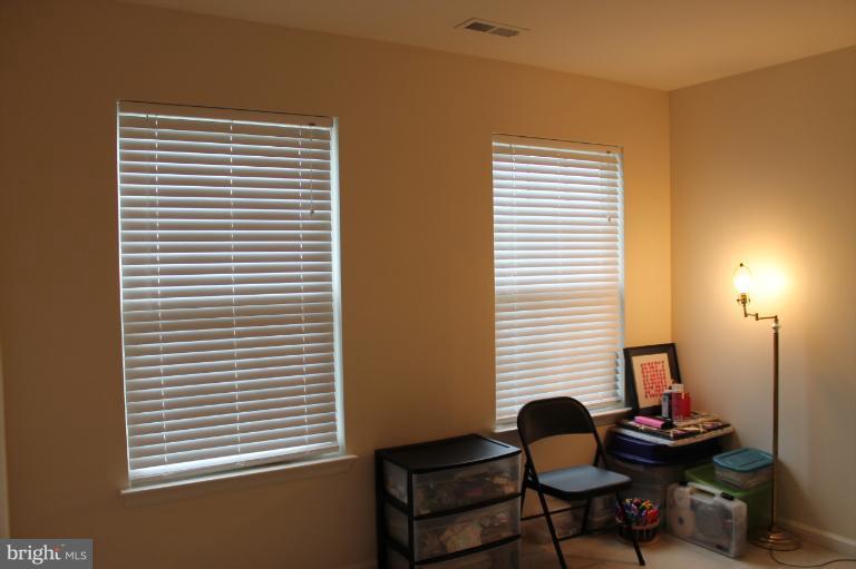 9 Boise Road Inwood, WV 25428 - Photo 10 of 30 a room with a window and chair