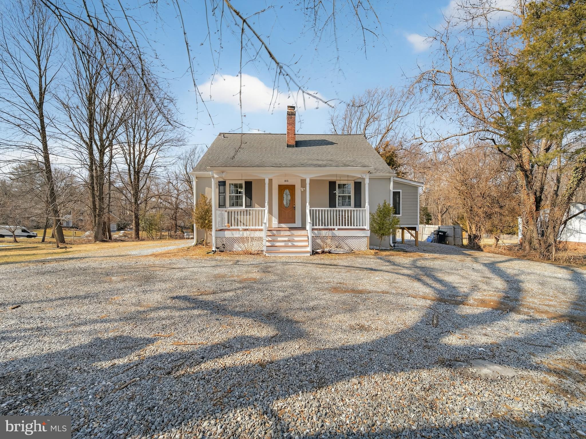 1815 Bonifant Road Silver Spring, MD 20906 - Photo 1 of 49 a front view of a house with a yard