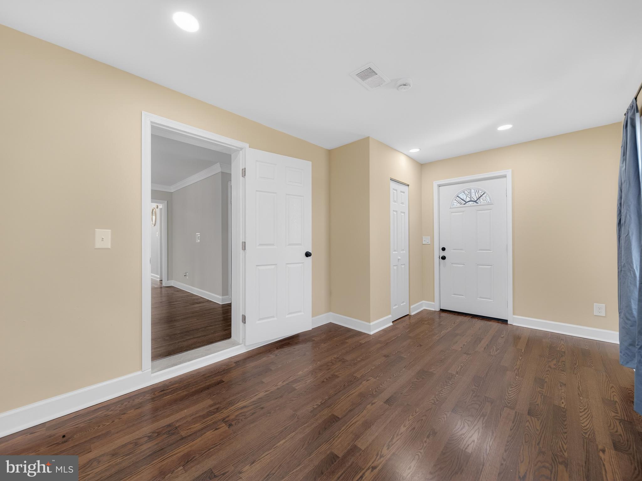 1815 Bonifant Road Silver Spring, MD 20906 - Photo 17 of 49 a view of an empty room with wooden floor