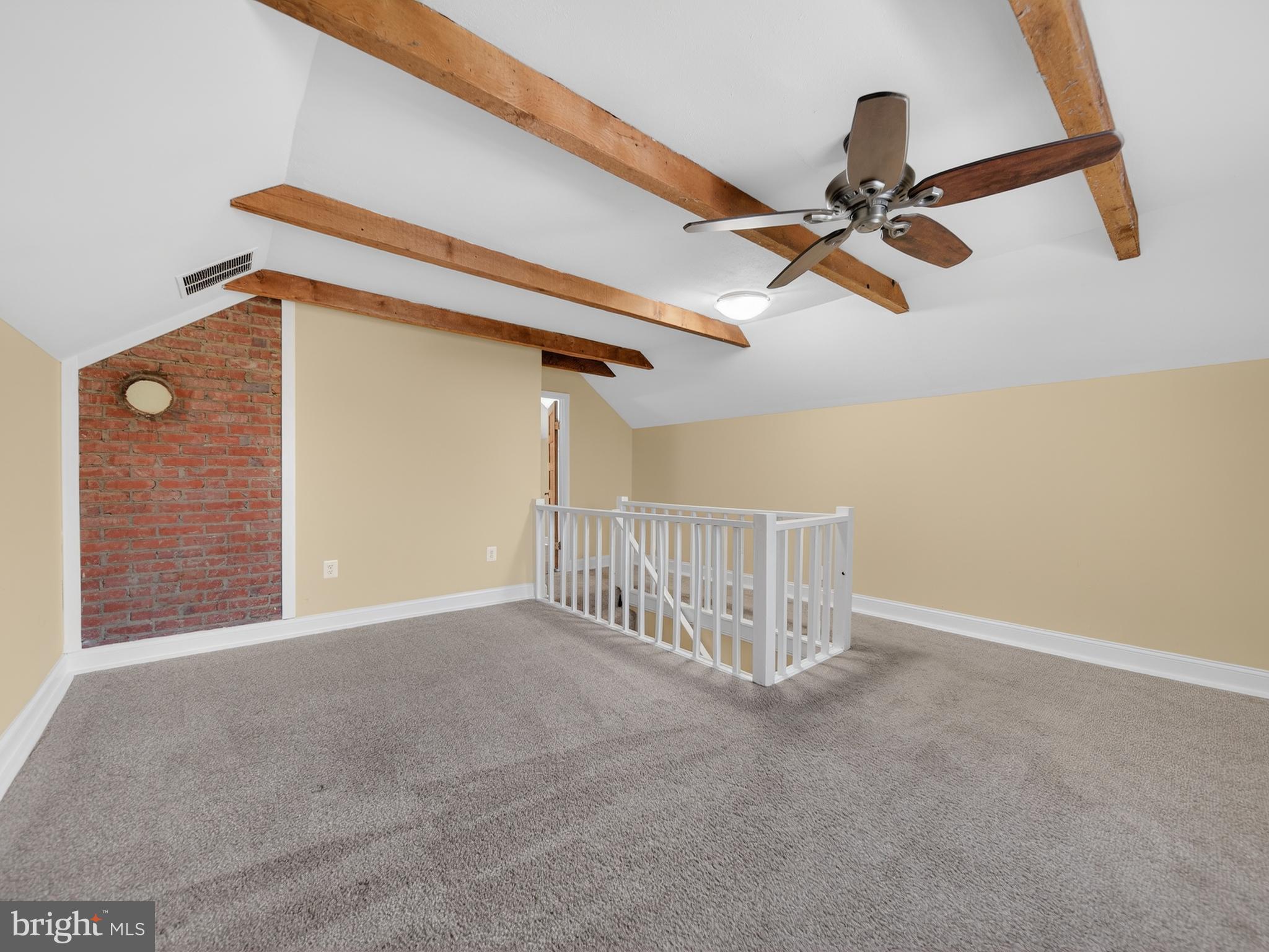 1815 Bonifant Road Silver Spring, MD 20906 - Photo 27 of 49 a view of a livingroom with a ceiling fan and window