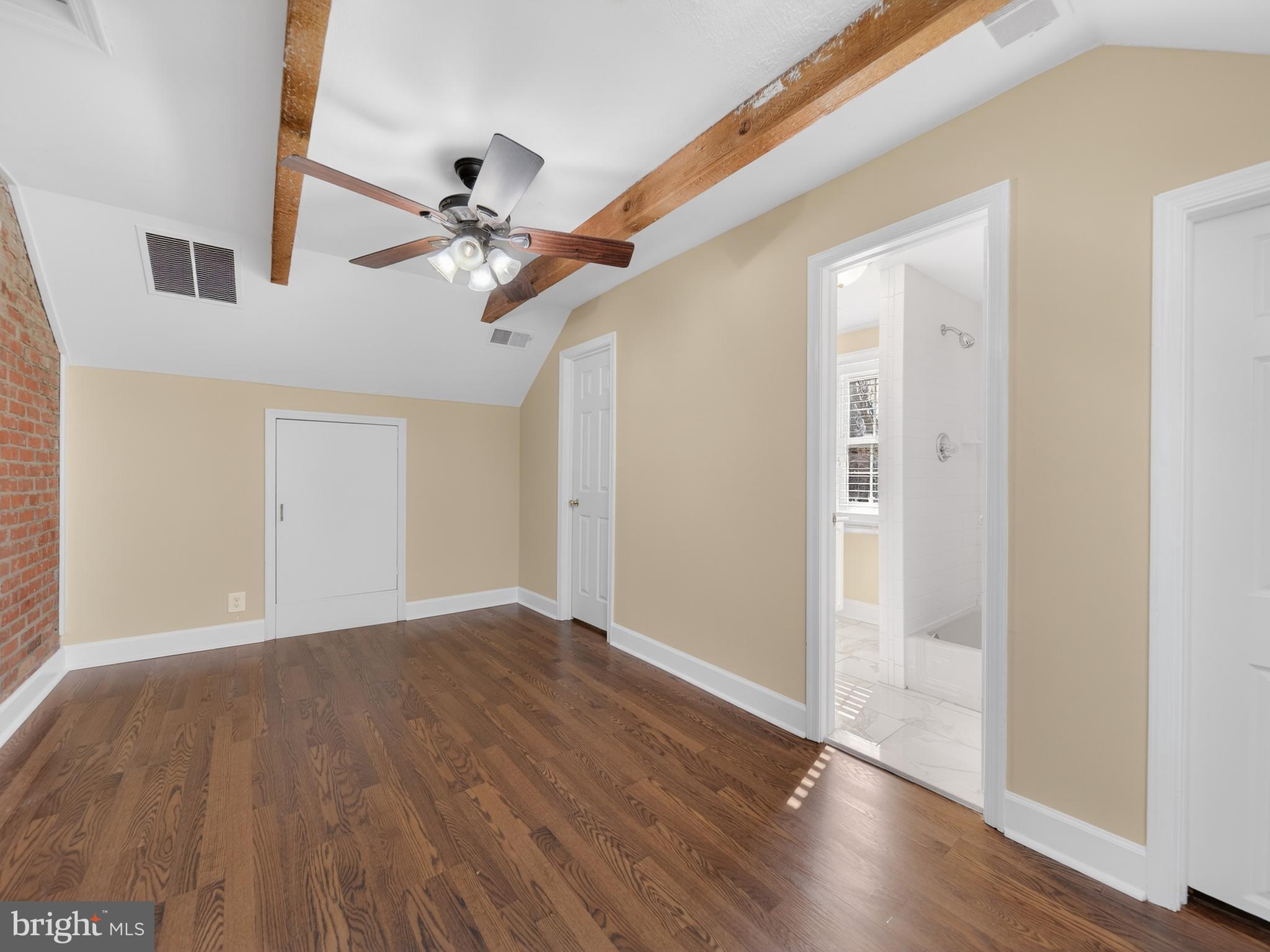 1815 Bonifant Road Silver Spring, MD 20906 - Photo 28 of 49 wooden floor in an empty room with a window