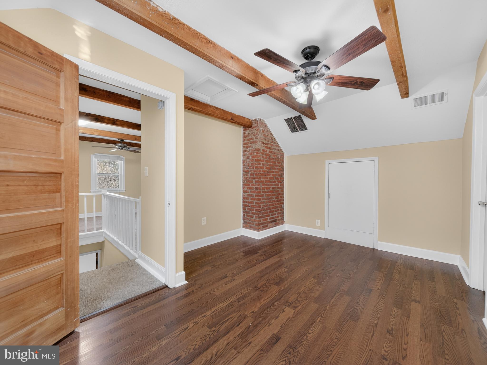 1815 Bonifant Road Silver Spring, MD 20906 - Photo 30 of 49 wooden floor in an empty room with a window