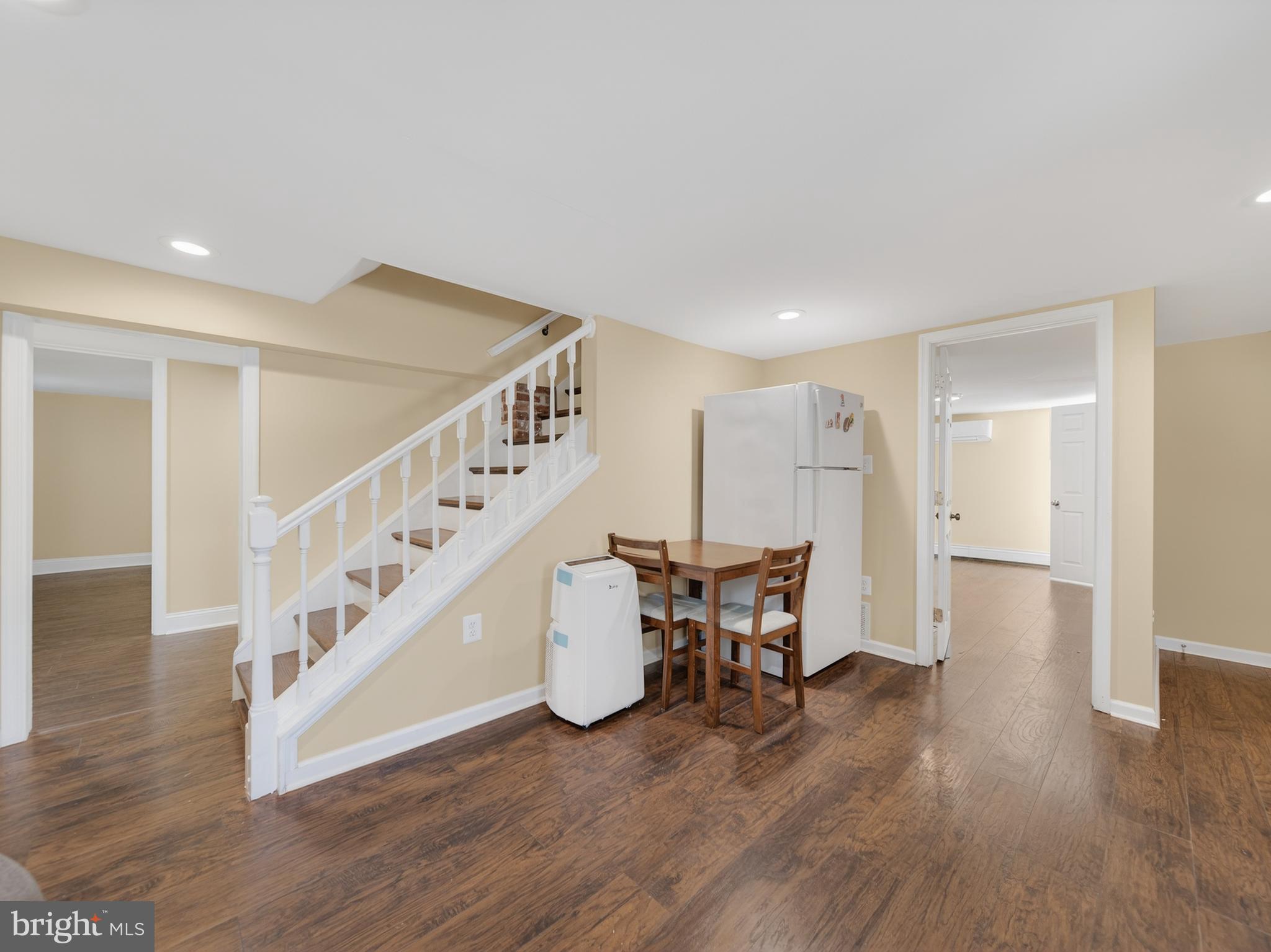 1815 Bonifant Road Silver Spring, MD 20906 - Photo 33 of 49 a view of dining room with furniture and wooden floor