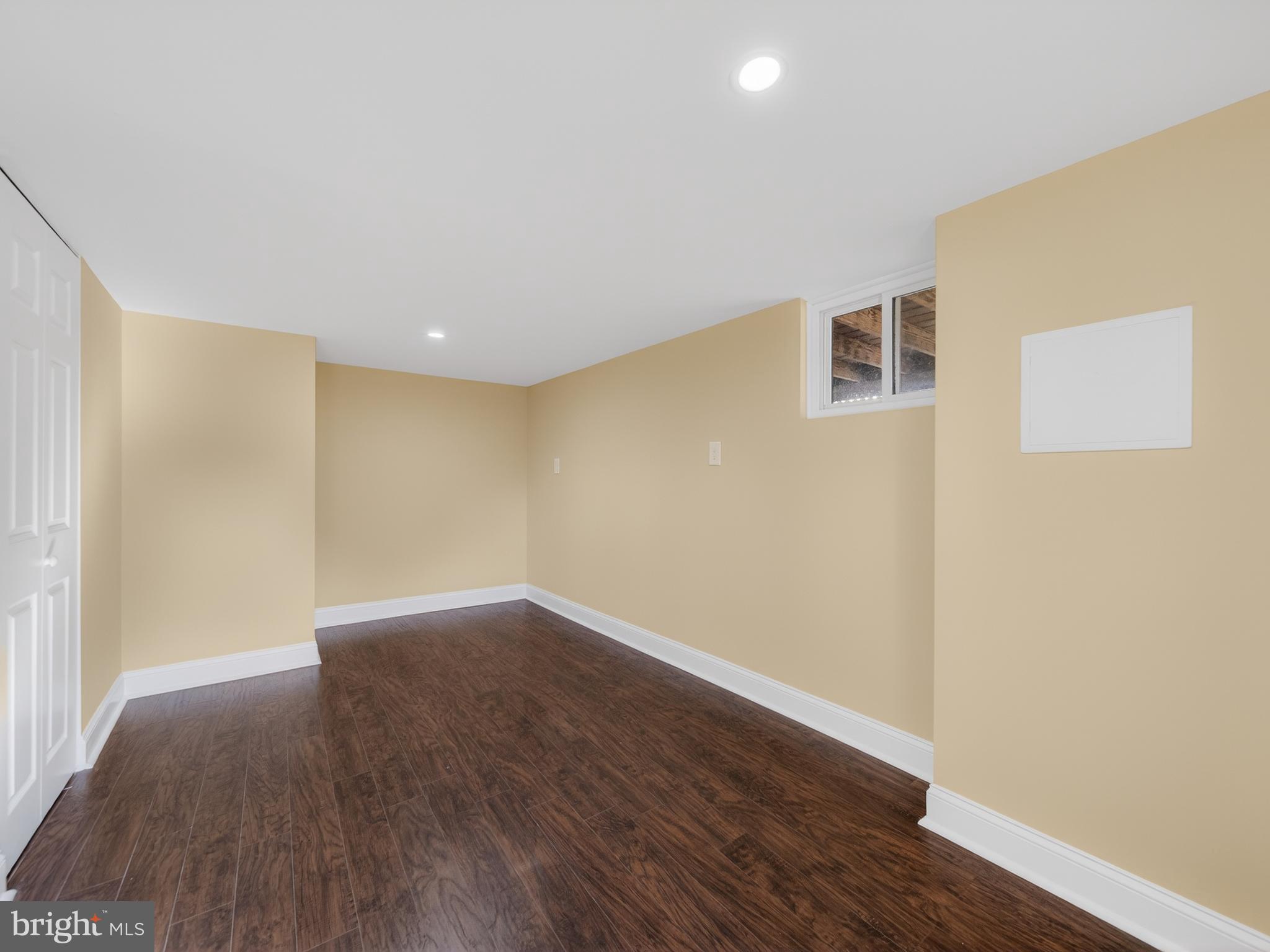 1815 Bonifant Road Silver Spring, MD 20906 - Photo 43 of 49 a view of an empty room with wooden floor
