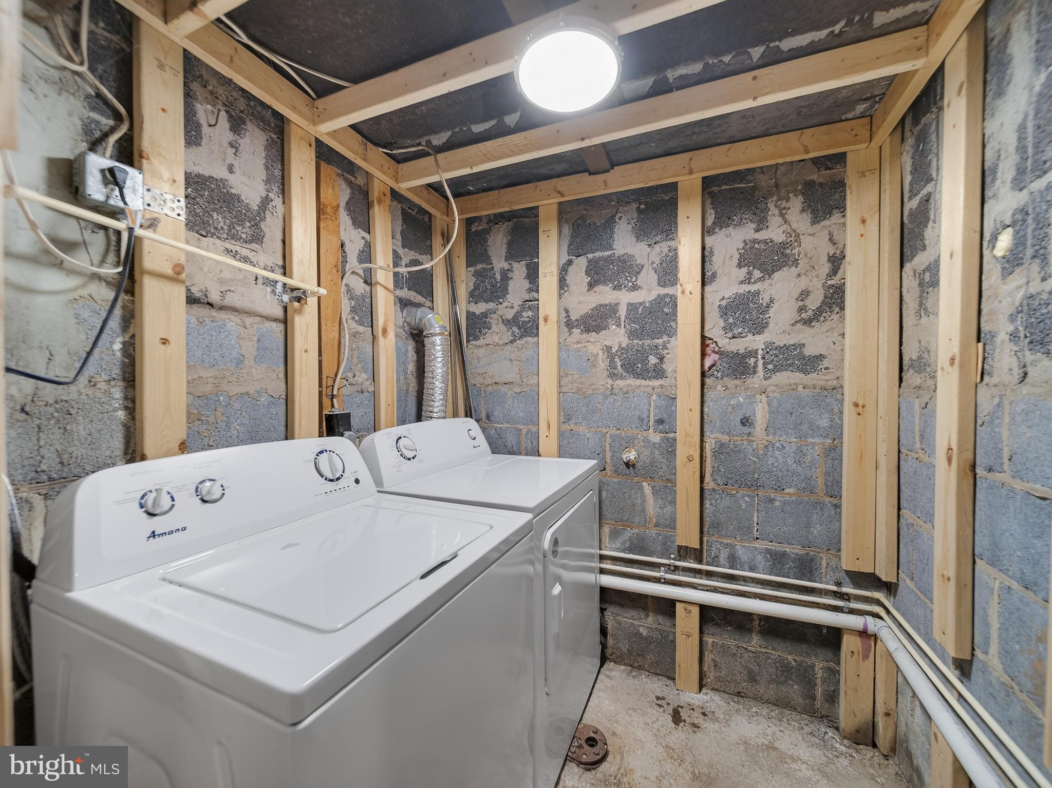 1815 Bonifant Road Silver Spring, MD 20906 - Photo 45 of 49 a utility room with dryer and washer