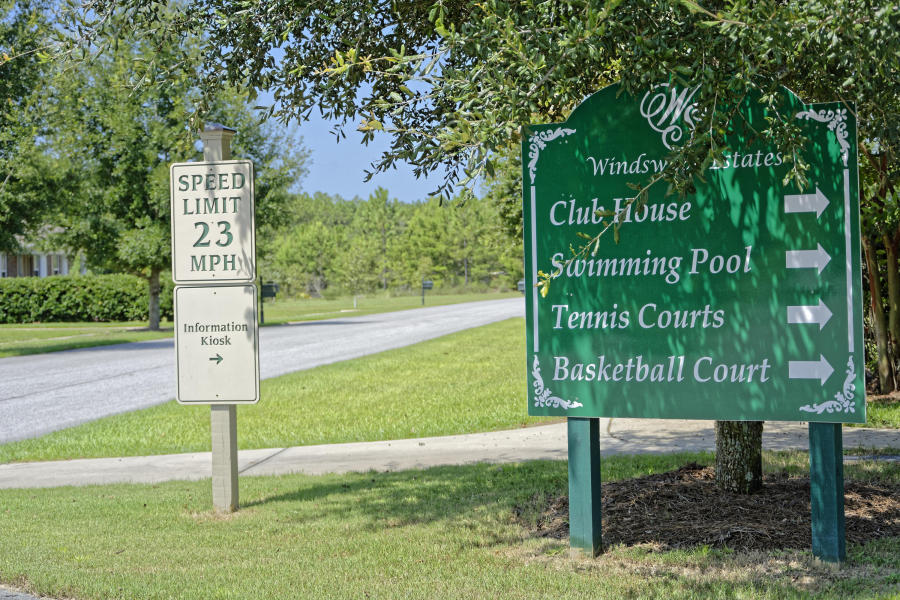 Lot 9 D Club Freeport, FL 32439 - Photo 7 of 20 a sign on the side of the road