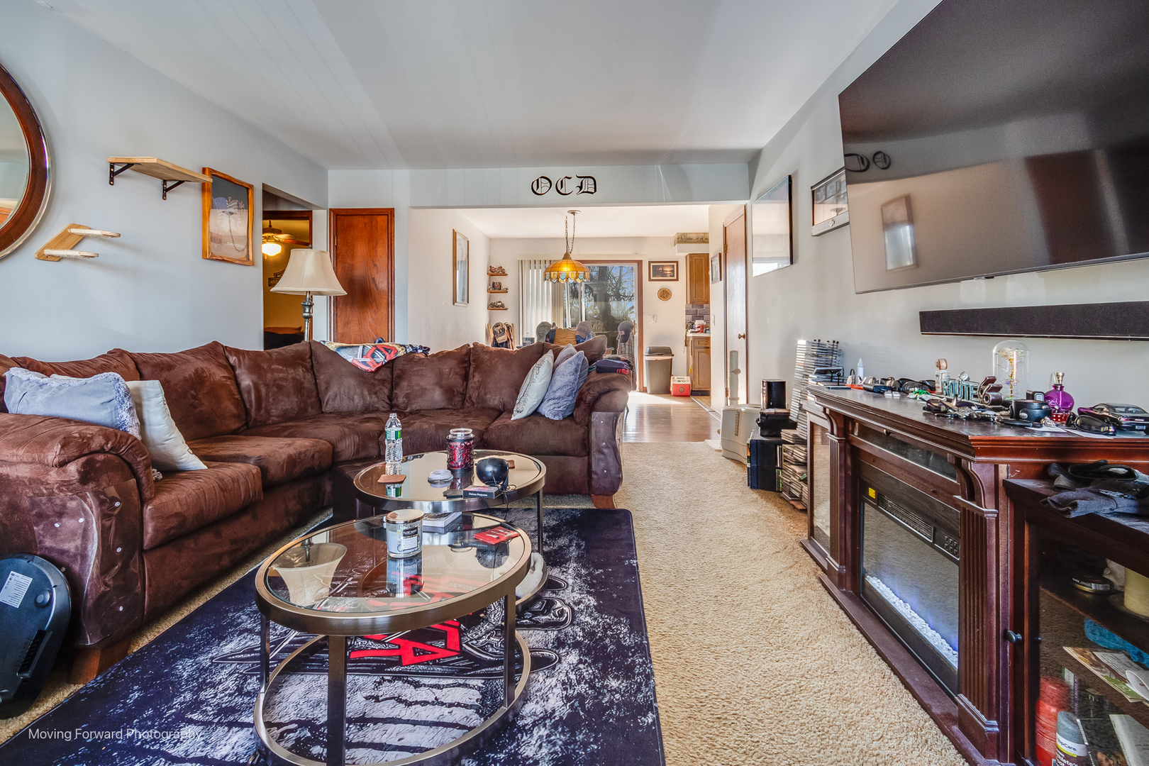 40w791 Big Timber Road Hampshire, IL 60140 - Photo 12 of 67 a living room with furniture and a fireplace