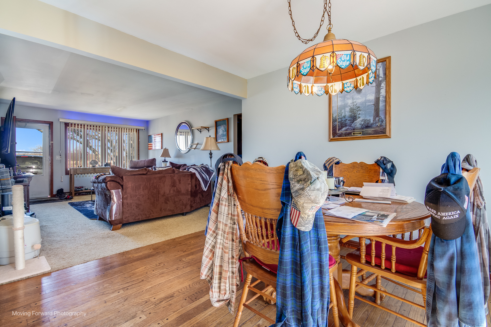 40w791 Big Timber Road Hampshire, IL 60140 - Photo 20 of 67 a living room with furniture a dining table and a chandelier