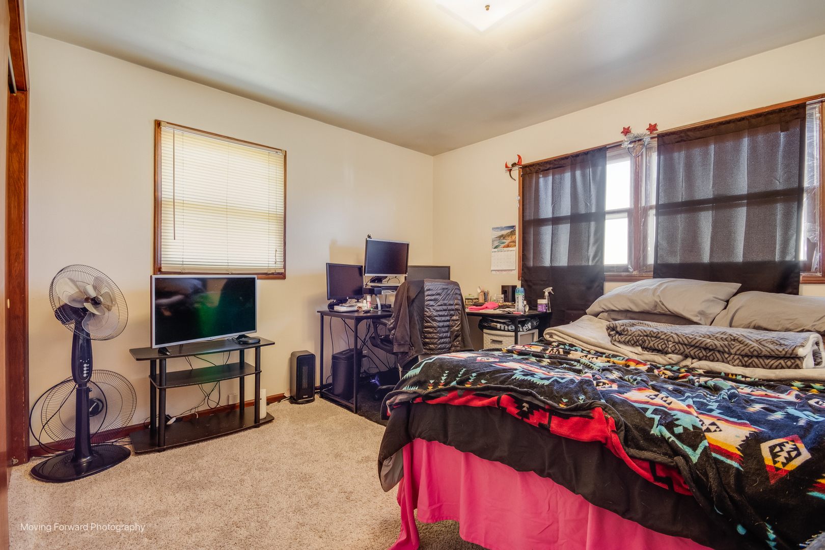 40w791 Big Timber Road Hampshire, IL 60140 - Photo 43 of 67 a bedroom with a bed large window and a flat tv screen