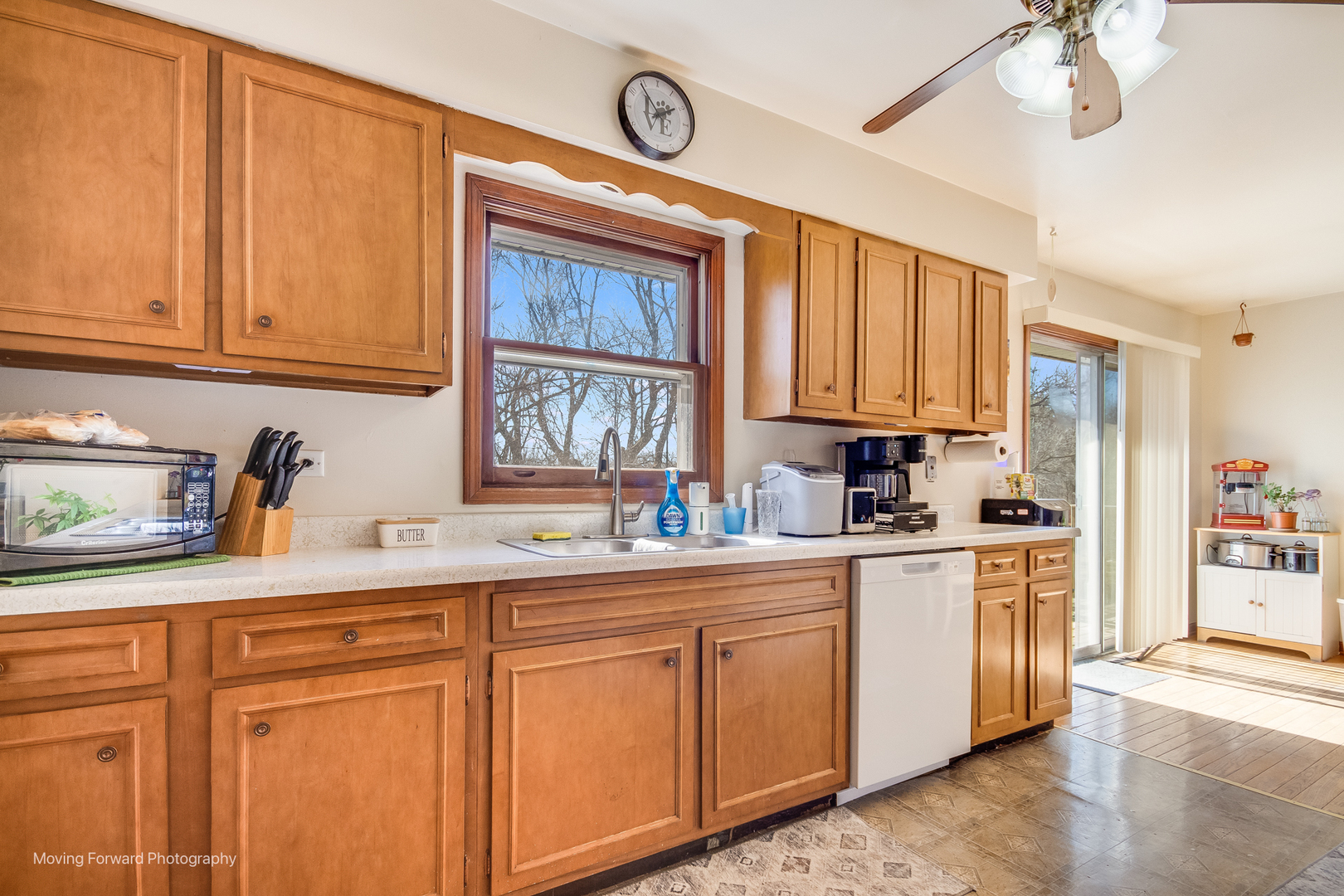 40w791 Big Timber Road Hampshire, IL 60140 - Photo 46 of 67 a kitchen with stainless steel appliances granite countertop a sink a stove cabinets and living room view