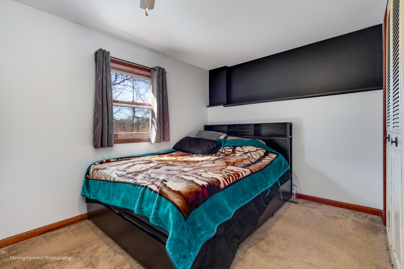 40w791 Big Timber Road Hampshire, IL 60140 - Photo 65 of 67 a bed sitting in a bedroom next to a window