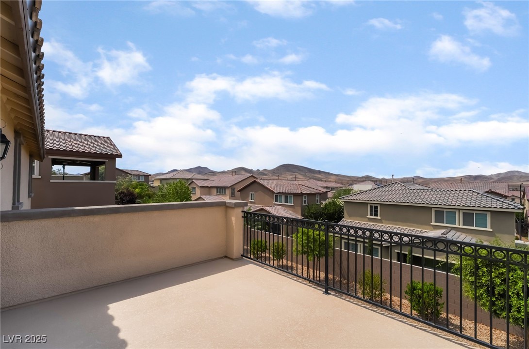 2575 Hazelburn Drive Henderson, NV 89044 - Photo 25 of 65 Patio / terrace featuring a residential view and a mountain view