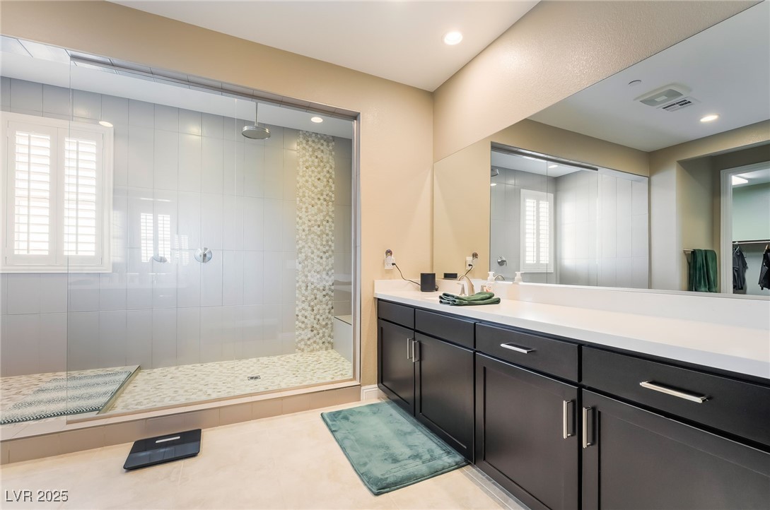 2575 Hazelburn Drive Henderson, NV 89044 - Photo 26 of 65 Full bath featuring a tile shower, vanity, and recessed lighting