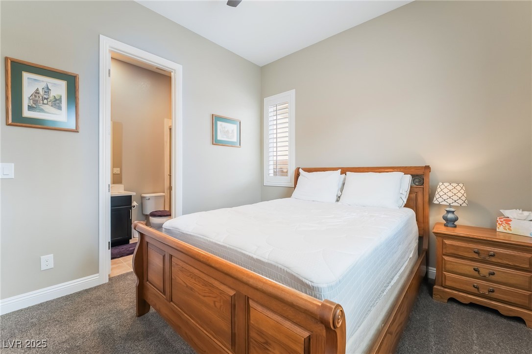 2575 Hazelburn Drive Henderson, NV 89044 - Photo 32 of 65 Carpeted bedroom with baseboards and ensuite bathroom