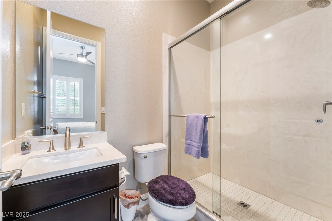 2575 Hazelburn Drive Henderson, NV 89044 - Photo 34 of 65 Bathroom featuring vanity and a shower stall
