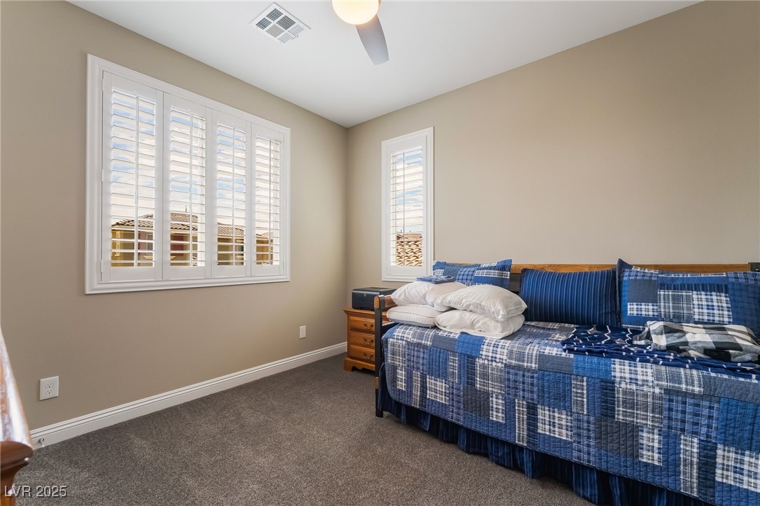 2575 Hazelburn Drive Henderson, NV 89044 - Photo 35 of 65 Bedroom featuring carpet floors and ceiling fan