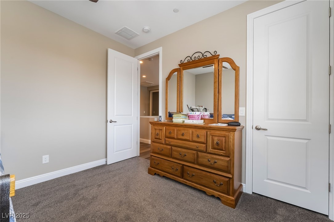2575 Hazelburn Drive Henderson, NV 89044 - Photo 36 of 65 Carpeted bedroom with baseboards