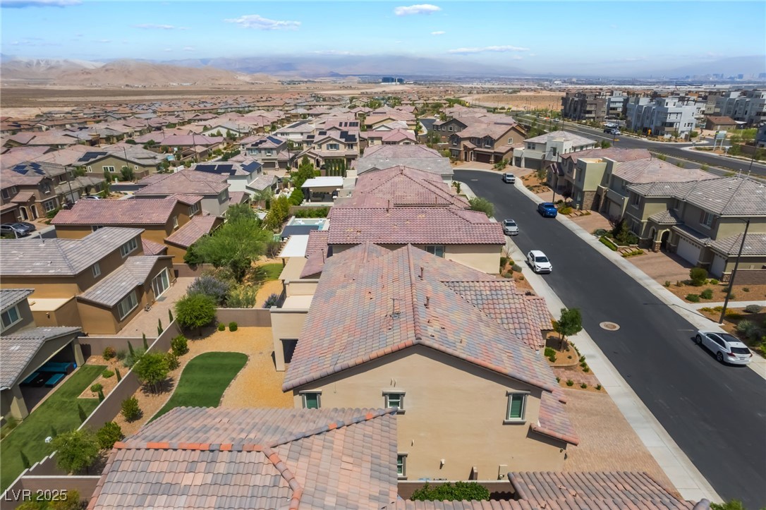 2575 Hazelburn Drive Henderson, NV 89044 - Photo 48 of 65 Aerial perspective of suburban area featuring a mountain backdrop