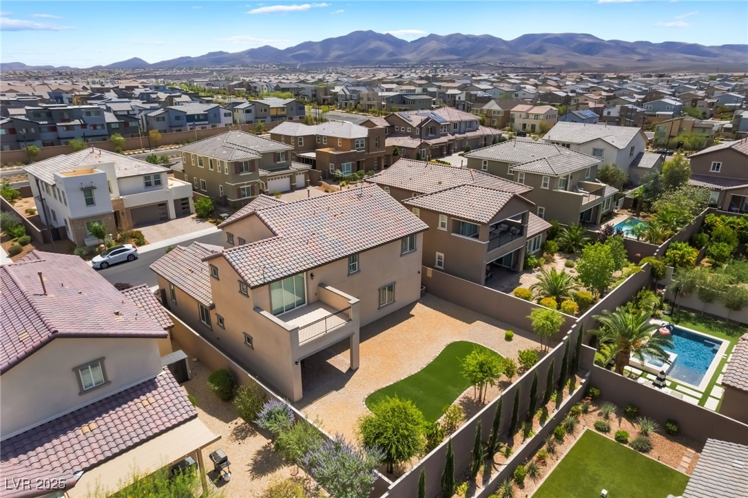 2575 Hazelburn Drive Henderson, NV 89044 - Photo 53 of 65 Aerial view of residential area featuring a mountain backdrop