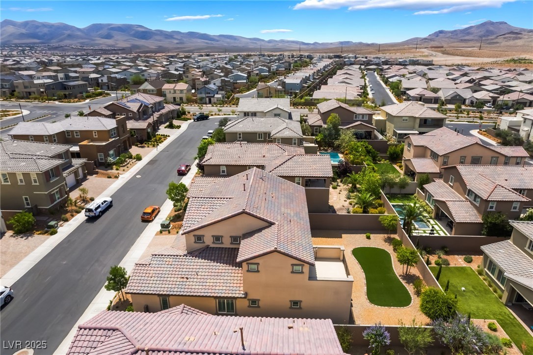 2575 Hazelburn Drive Henderson, NV 89044 - Photo 54 of 65 Aerial perspective of suburban area with mountains
