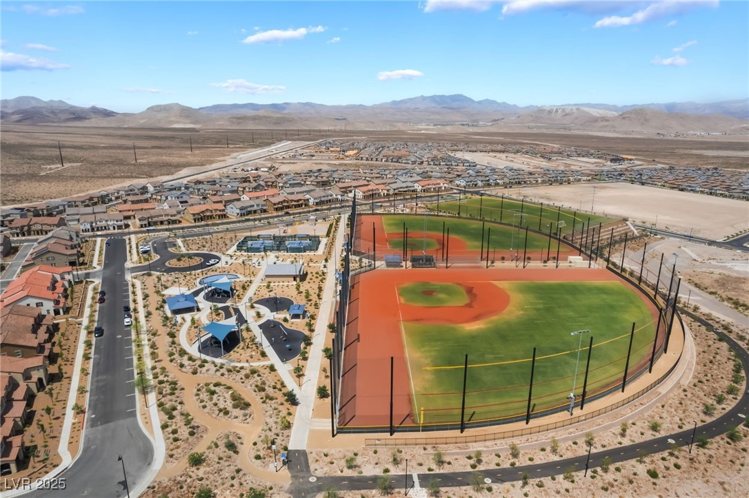 2575 Hazelburn Drive Henderson, NV 89044 - Photo 59 of 65 Aerial perspective of suburban area with a mountainous background
