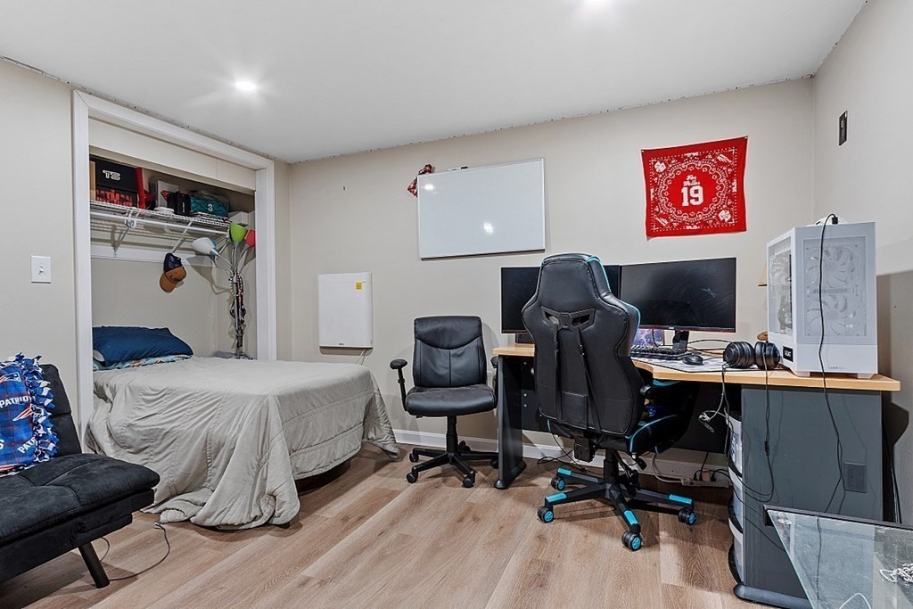 85 Blood Road Charlton, MA 01507 - Photo 24 of 30 a view of a workspace with furniture and a window