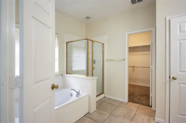 a kitchen with stainless steel appliances granite countertop a sink and a stove