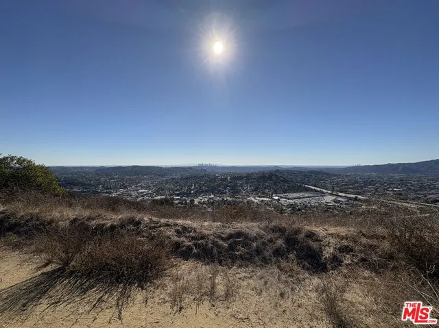 an aerial view of residential space and tree