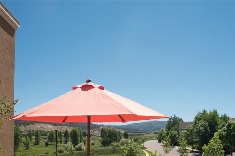 1020 Capitol Street, Unit R2 Eagle, CO 81631 - Photo 13 of 22 an outdoor space with furniture and umbrella