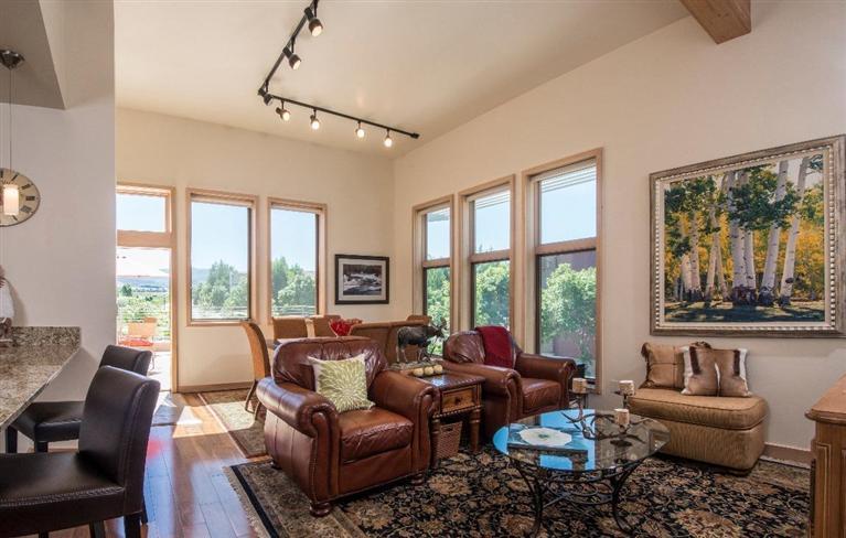 1020 Capitol Street, Unit R2 Eagle, CO 81631 - Photo 2 of 22 a living room with furniture and a large window