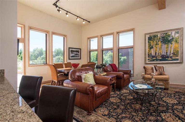 1020 Capitol Street, Unit R2 Eagle, CO 81631 - Photo 3 of 22 a living room with furniture and large windows