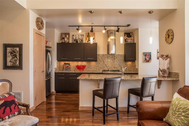 1020 Capitol Street, Unit R2 Eagle, CO 81631 - Photo 5 of 22 a kitchen with stainless steel appliances granite countertop a sink and cabinets