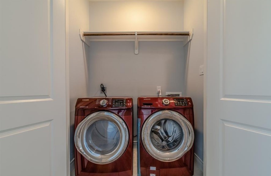 8907 Spring Knoll Forest Drive Houston, TX 77080 - Photo 18 of 21 The laundry room on second floor. Washer and Dryer included