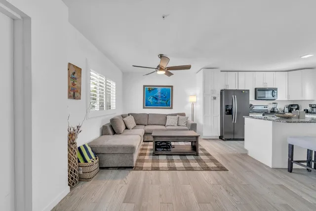 a bathroom with a sink and shower