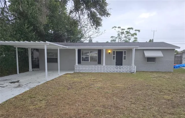 front view of a house with a big yard